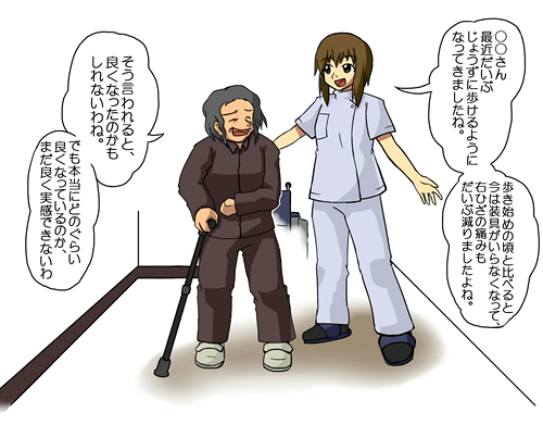 病棟の廊下で患者と新人理学療法士が会話をしている場面
